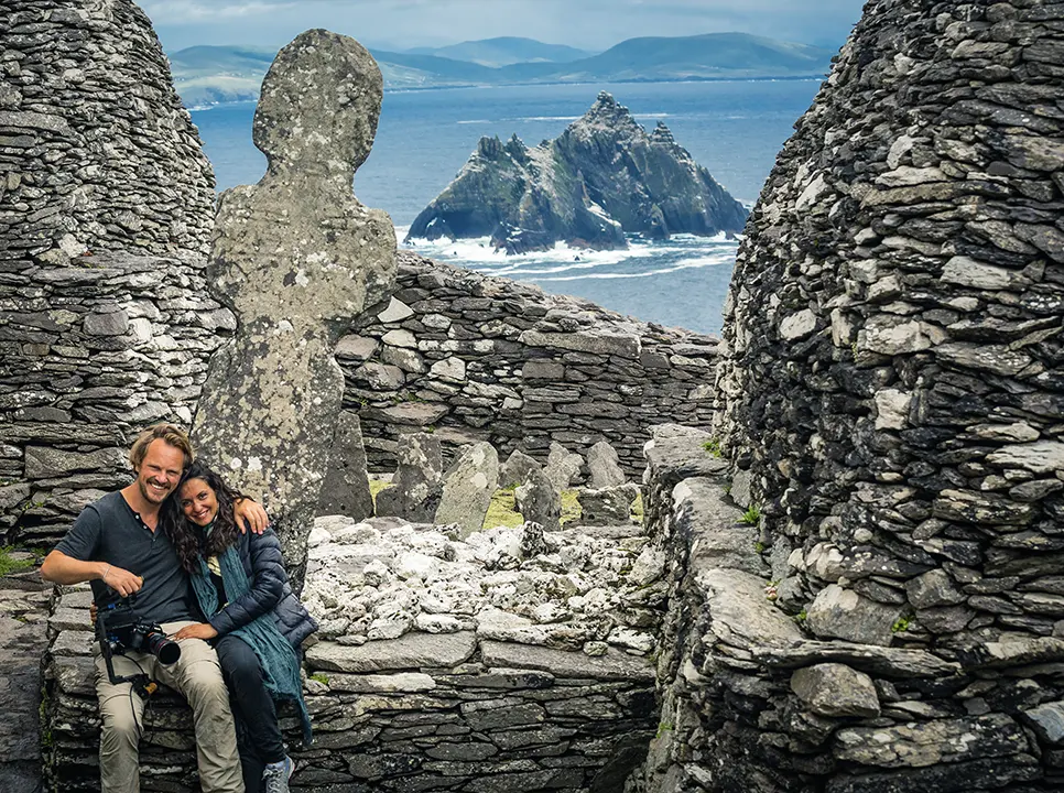SCA Skellig Island Couple sitting on wall